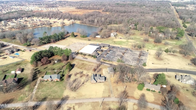 drone / aerial view featuring a rural view and a water view