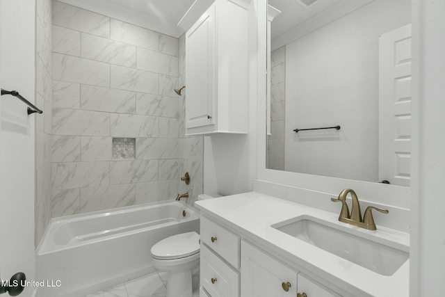 full bathroom featuring vanity, tiled shower / bath combo, toilet, and ornamental molding