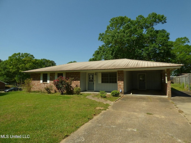 816 Hart Rd, Mccomb, MS 39648 - ranch-style home with a front yard, driveway, a carport, and brick siding