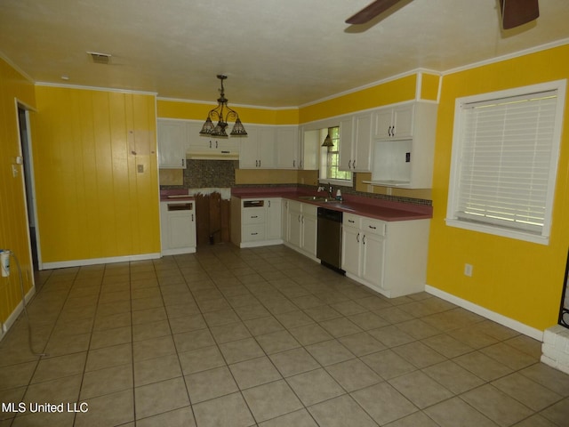 816 Hart Rd, Mccomb, MS 39648 - kitchen featuring stainless steel dishwasher, dark countertops, a ceiling fan, and white cabinetry