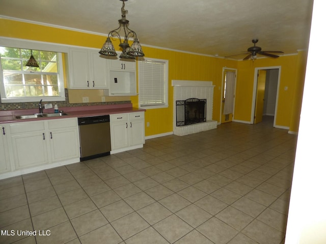 816 Hart Rd, Mccomb, MS 39648 - kitchen featuring crown molding, white cabinets, a sink, dishwasher, and ceiling fan with notable chandelier