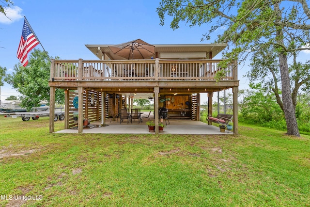 11334 Texas St, Bay Saint Louis, MS 39520 - rear view of property with a wooden deck, a patio, a yard, and stairway