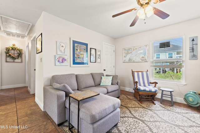 11334 Texas St, Bay Saint Louis, MS 39520 - tiled living area with attic access, ceiling fan, and baseboards