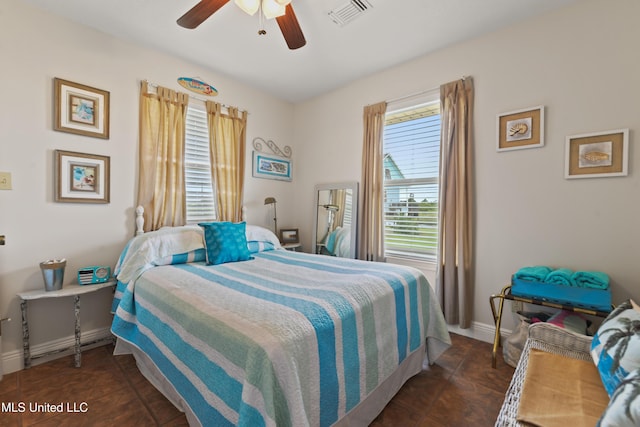 11334 Texas St, Bay Saint Louis, MS 39520 - bedroom with baseboards and a ceiling fan