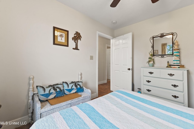 11334 Texas St, Bay Saint Louis, MS 39520 - bedroom featuring baseboards and ceiling fan