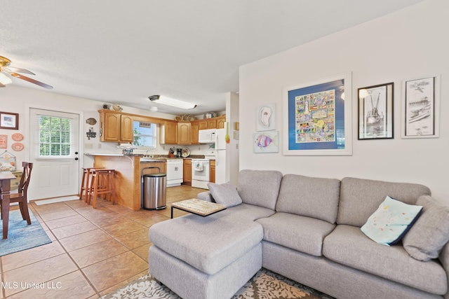 11334 Texas St, Bay Saint Louis, MS 39520 - living area with a ceiling fan and light tile patterned flooring