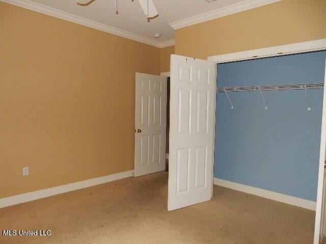 8 Auburn Ln, Hattiesburg, MS 39401 - unfurnished bedroom featuring ornamental molding, carpet, a closet, baseboards, and ceiling fan