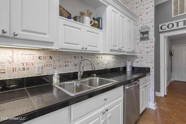 408 Abbey Woods, Brandon, MS 39047 - kitchen featuring a sink, white cabinetry, stainless steel dishwasher, and tile countertops
