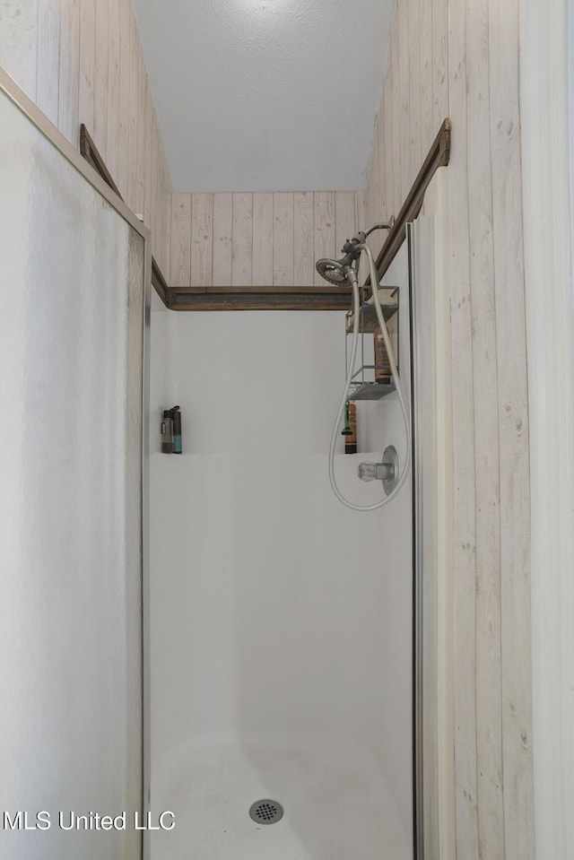 408 Abbey Woods, Brandon, MS 39047 - bathroom view of a shower stall and wood walls