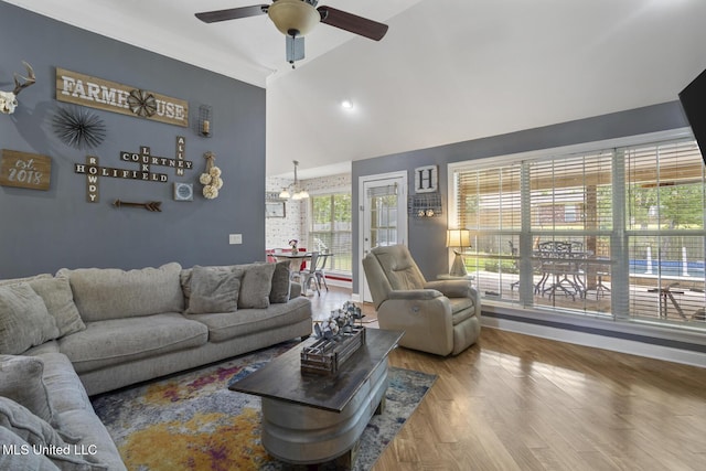 408 Abbey Woods, Brandon, MS 39047 - living room with lofted ceiling, ceiling fan, and wood finished floors