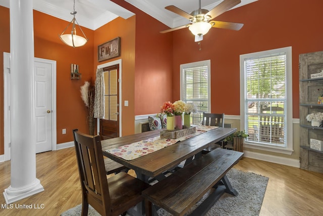 408 Abbey Woods, Brandon, MS 39047 - dining space featuring ornate columns, a high ceiling, crown molding, light wood finished floors, and a ceiling fan