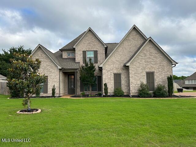 3717 Beech Tree Cv, Southaven, MS 38672 - view of front of property featuring a front yard and brick siding