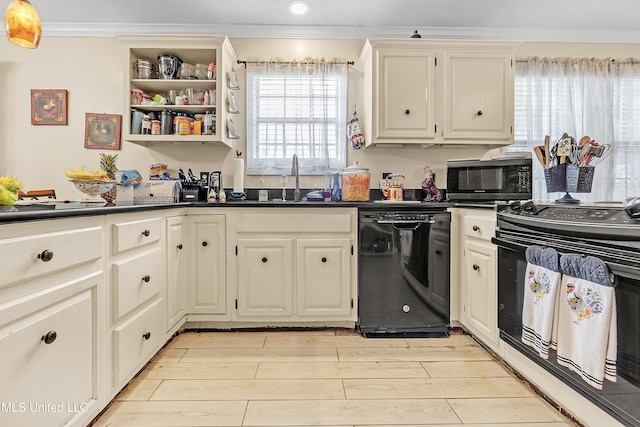 231 Hickory Ln, Batesville, MS 38606 - kitchen with black appliances, dark countertops, crown molding, a sink, and light wood-type flooring