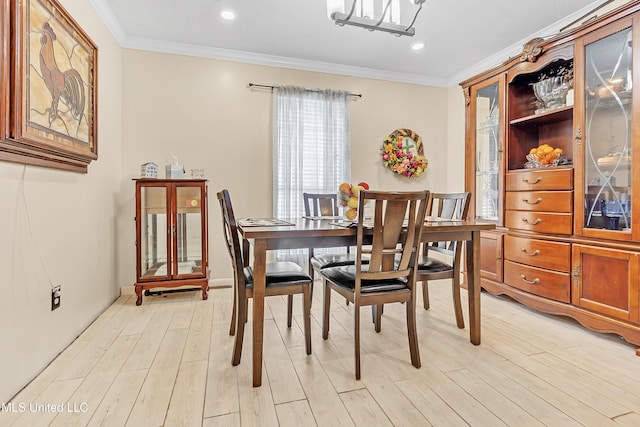 231 Hickory Ln, Batesville, MS 38606 - dining area featuring crown molding, light wood-type flooring, recessed lighting, and a chandelier