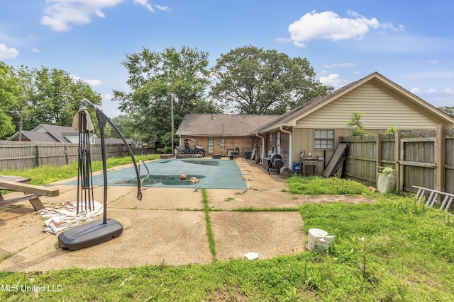 231 Hickory Ln, Batesville, MS 38606 - view of pool featuring a patio area and a fenced backyard
