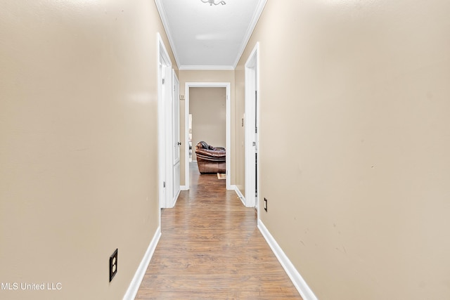 231 Hickory Ln, Batesville, MS 38606 - hallway with ornamental molding, light wood finished floors, and baseboards