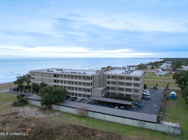 view of building exterior with a water view