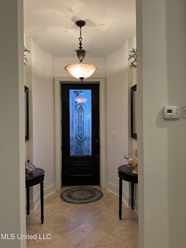 entrance foyer featuring baseboards