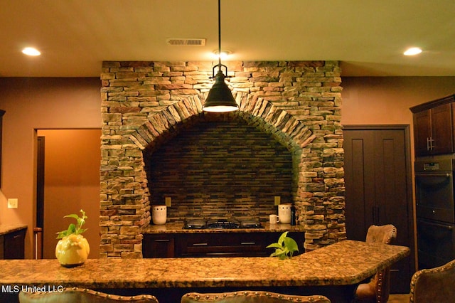 1088 S Red Banks Rd, Byhalia, MS 38611 - kitchen with black appliances, dark brown cabinets, and recessed lighting
