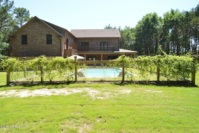 1088 S Red Banks Rd, Byhalia, MS 38611 - view of pool featuring a yard and a wooden deck