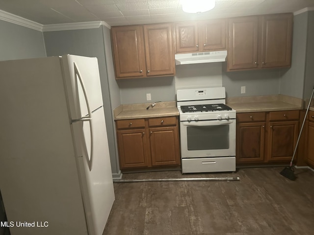 kitchen featuring white appliances, ornamental molding, and dark hardwood / wood-style floors