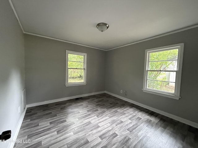 4189 Del Rosa Dr, Jackson, MS 39206 - empty room featuring ornamental molding and wood finished floors