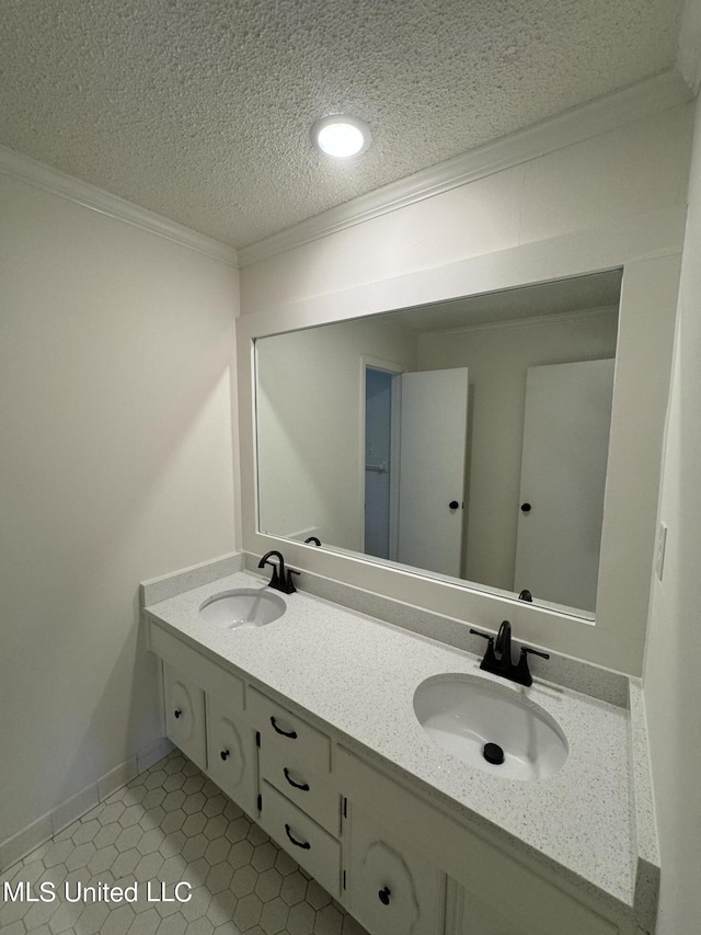 bathroom featuring vanity, a textured ceiling, and tile patterned flooring