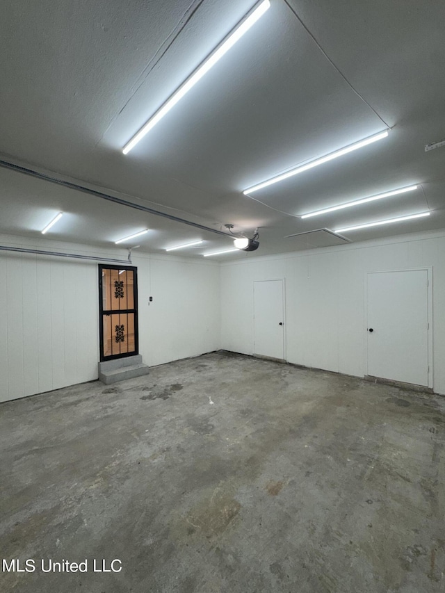 garage featuring a garage door opener