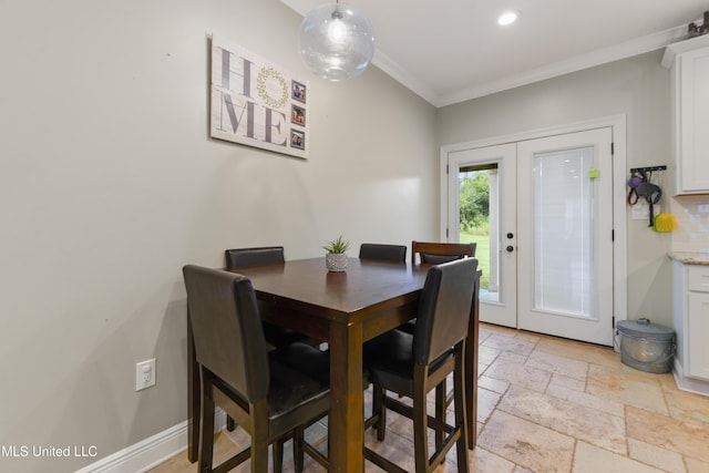 3112 Eagle Ridge Rd, Vancleave, MS 39565 - dining area featuring stone tile flooring, ornamental molding, recessed lighting, and french doors