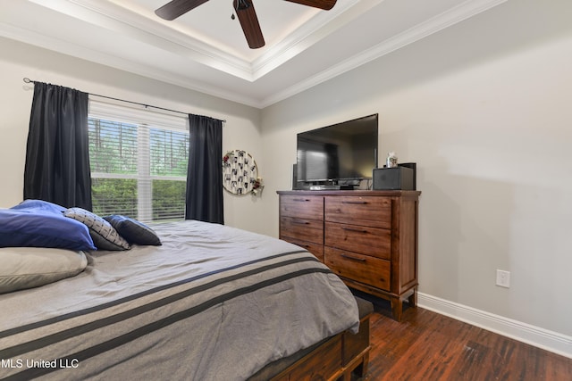 3112 Eagle Ridge Rd, Vancleave, MS 39565 - bedroom featuring dark wood-style flooring, ornamental molding, a raised ceiling, and ceiling fan
