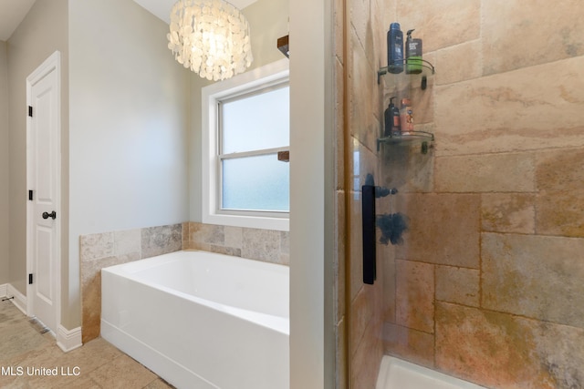 3112 Eagle Ridge Rd, Vancleave, MS 39565 - bathroom with a bath, tiled shower, a chandelier, and tile patterned floors