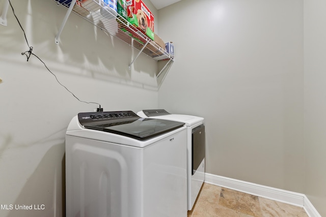 3112 Eagle Ridge Rd, Vancleave, MS 39565 - washroom with washing machine and clothes dryer and baseboards