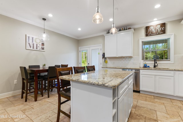 3112 Eagle Ridge Rd, Vancleave, MS 39565 - kitchen featuring stainless steel dishwasher, crown molding, recessed lighting, stone tile floors, and decorative backsplash