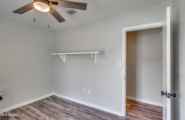 118 Bellegrove Blvd, Brandon, MS 39047 - empty room with a ceiling fan, baseboards, visible vents, and wood finished floors