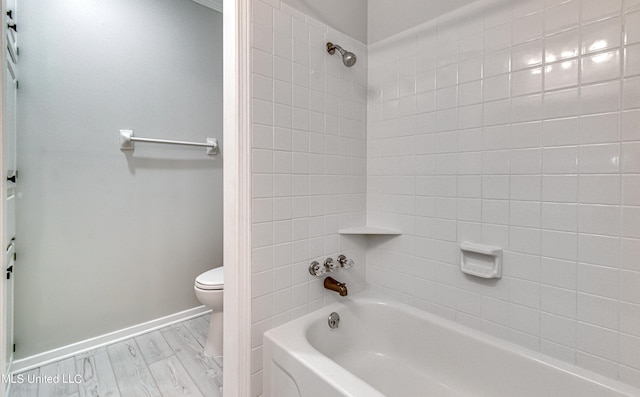 118 Bellegrove Blvd, Brandon, MS 39047 - bathroom with toilet, baseboards, and shower / tub combination