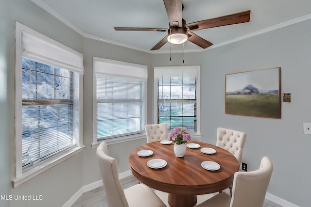 118 Bellegrove Blvd, Brandon, MS 39047 - dining area featuring crown molding, baseboards, ceiling fan, and light wood-style flooring