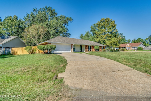 118 Bellegrove Blvd, Brandon, MS 39047 - ranch-style home featuring a garage, fence, driveway, and a front yard