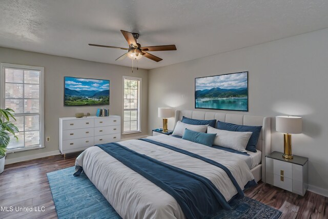 118 Bellegrove Blvd, Brandon, MS 39047 - bedroom featuring baseboards, ceiling fan, and wood finished floors