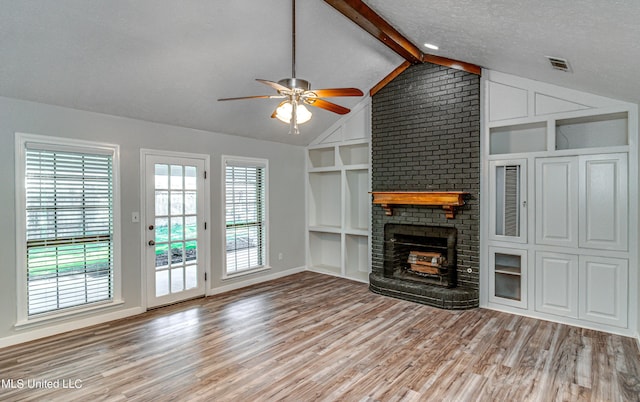118 Bellegrove Blvd, Brandon, MS 39047 - unfurnished living room featuring vaulted ceiling with beams, ceiling fan, baseboards, and wood finished floors