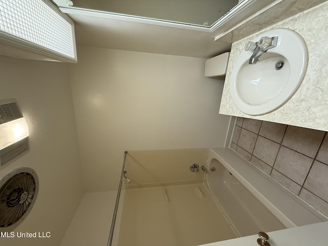 1632 Winchester St, Jackson, MS 39211 - washroom with a sink and heating unit
