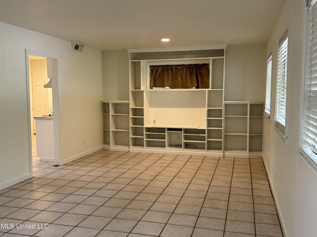 1632 Winchester St, Jackson, MS 39211 - unfurnished room with light tile patterned floors, recessed lighting, and baseboards