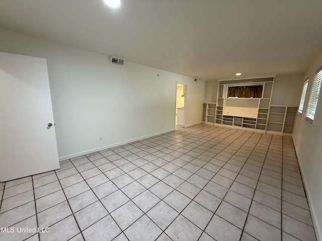 1632 Winchester St, Jackson, MS 39211 - empty room featuring baseboards, recessed lighting, and light tile patterned floors