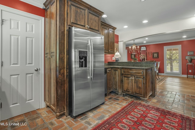 2629 Park View Dr, Biloxi, MS 39531 - kitchen featuring stainless steel refrigerator with ice dispenser, crown molding, brick flooring, baseboards, and a peninsula