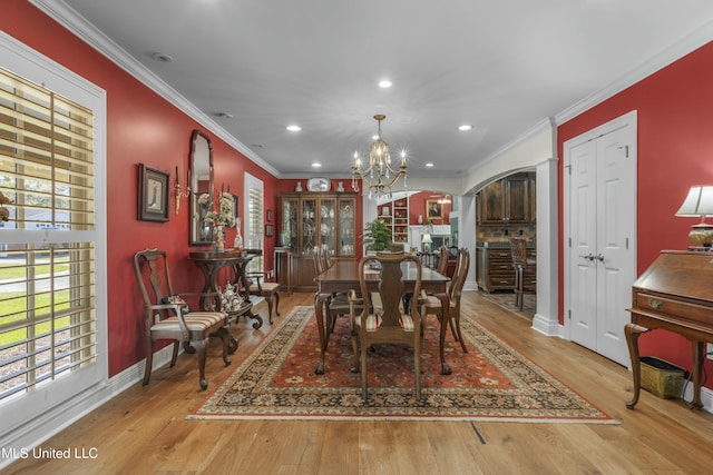 2629 Park View Dr, Biloxi, MS 39531 - dining room with baseboards, a chandelier, recessed lighting, crown molding, and wood finished floors