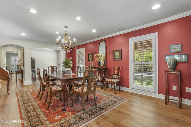 2629 Park View Dr, Biloxi, MS 39531 - dining space featuring arched walkways, decorative columns, baseboards, recessed lighting, and crown molding