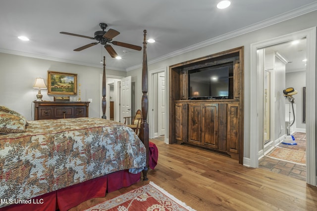 2629 Park View Dr, Biloxi, MS 39531 - bedroom with wood finished floors, ornamental molding, recessed lighting, ensuite bathroom, and baseboards