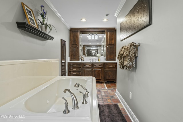 2629 Park View Dr, Biloxi, MS 39531 - full bathroom with crown molding, a tub with jets, vanity, recessed lighting, and baseboards