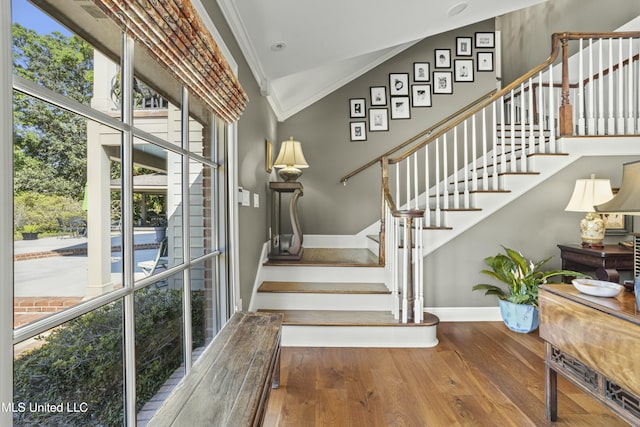 2629 Park View Dr, Biloxi, MS 39531 - stairs with wood finished floors, baseboards, and ornamental molding