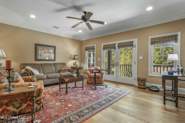 2629 Park View Dr, Biloxi, MS 39531 - living room featuring ceiling fan, ornamental molding, recessed lighting, hardwood / wood-style flooring, and french doors