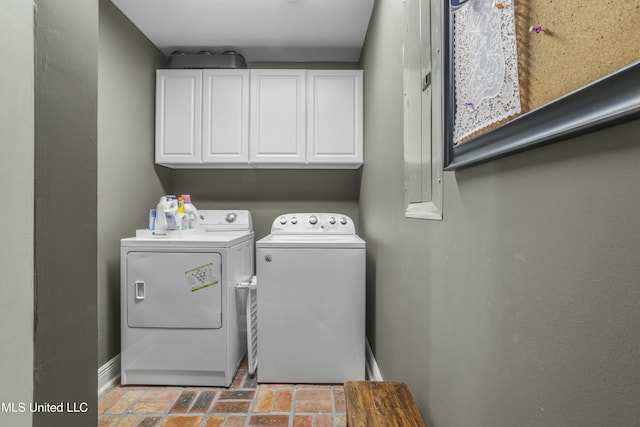 2629 Park View Dr, Biloxi, MS 39531 - laundry area featuring washer and dryer, cabinet space, brick flooring, baseboards, and electric panel